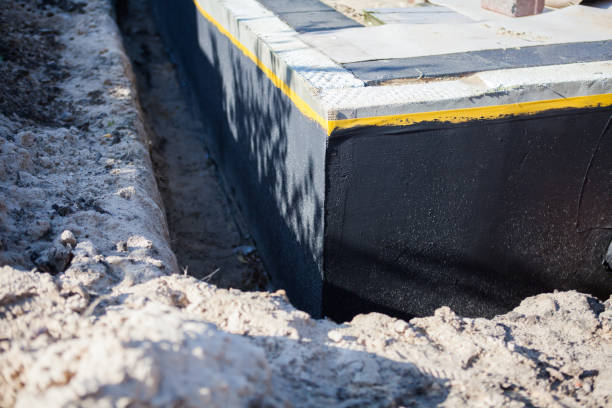 Professional Waterproofing technician working in Norwalk, OH